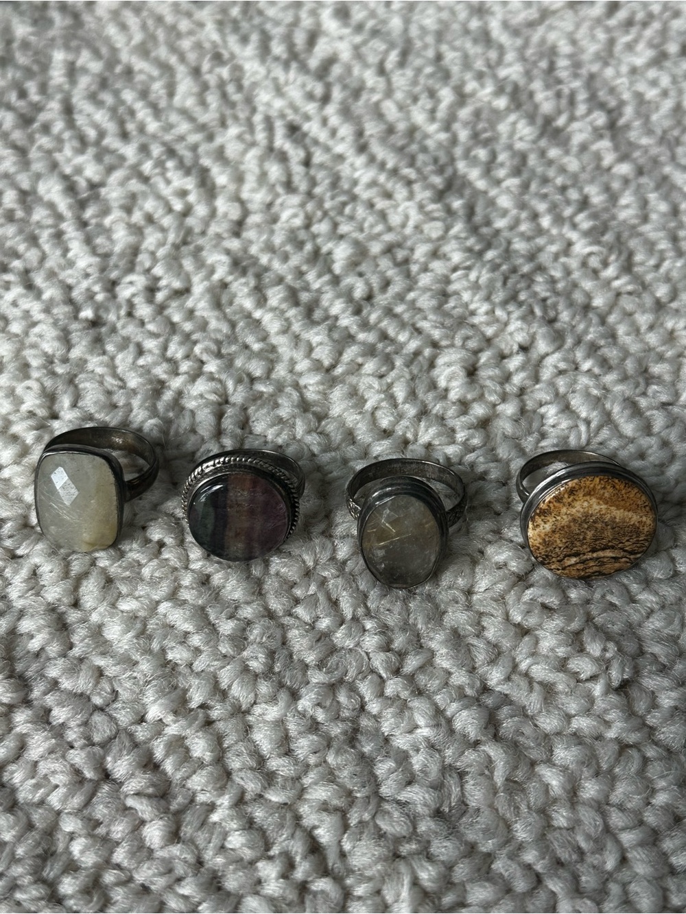 Set of 4 semi precious stone rings